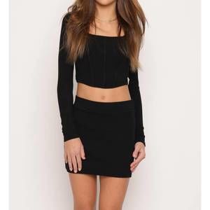 NEW KAVEAH girl's ribbed skirt in black
